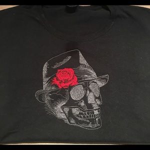 Embroidered skull T-shirt.
